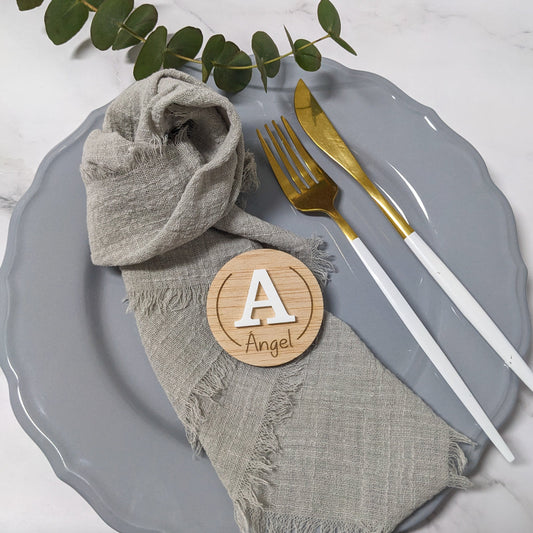 Marcasitios redondo Inicial metacrilato